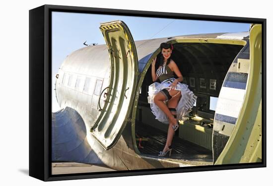 Sexy 1940's Style Pin-Up Girl Standing Inside of a C-47 Skytrain Aircraft-null-Framed Stretched Canvas