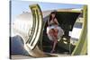 Sexy 1940's Style Pin-Up Girl Standing Inside of a C-47 Skytrain Aircraft-null-Stretched Canvas