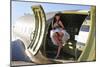 Sexy 1940's Style Pin-Up Girl Standing Inside of a C-47 Skytrain Aircraft-null-Mounted Photographic Print
