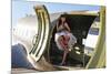 Sexy 1940's Style Pin-Up Girl Standing Inside of a C-47 Skytrain Aircraft-null-Mounted Photographic Print