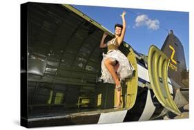 Sexy 1940's Style Pin-Up Girl Standing Inside of a C-47 Skytrain Aircraft-null-Stretched Canvas