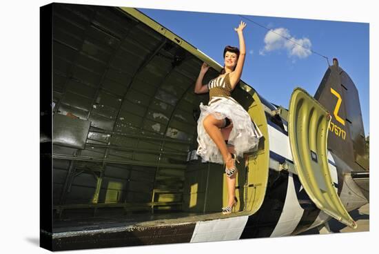 Sexy 1940's Style Pin-Up Girl Standing Inside of a C-47 Skytrain Aircraft-null-Stretched Canvas