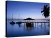 Seychelles, Praslin Island, Anse Bois De Rose, Pier at the Coco De Mer Hotel, Sunset-Walter Bibikow-Stretched Canvas