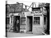 Shack Like Black Jeweler Shop Next to Food Store Covered with Ads in a Slum Section of the City.-Alfred Eisenstaedt-Stretched Canvas