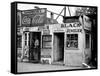 Shack Like Black Jeweler Shop Next to Food Store Covered with Ads in a Slum Section of the City.-Alfred Eisenstaedt-Framed Stretched Canvas