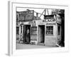 Shack Like Black Jeweler Shop Next to Food Store Covered with Ads in a Slum Section of the City.-Alfred Eisenstaedt-Framed Photographic Print