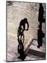 Shadow and Silhouette of Cyclistist and Pedestrian, New York, New York, USA-null-Mounted Photographic Print