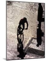 Shadow and Silhouette of Cyclistist and Pedestrian, New York, New York, USA-null-Mounted Photographic Print