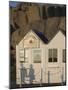 Shadow of Couple Walking Past Beach Huts, Granite Boulders, Cote De Granit Rose, Brittany-David Hughes-Mounted Photographic Print