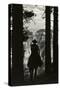 Shadow of Cowboy Sitting in Tree Line-null-Stretched Canvas
