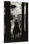 Shadow of Cowboy Sitting in Tree Line-null-Stretched Canvas