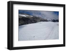 Shadow of helicopter flying over glacier, Mount Aspiring National Park, West Coast, South Island...-null-Framed Photographic Print