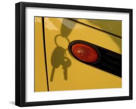 Shadow of Keys Against a Yellow Car-null-Framed Premium Photographic Print