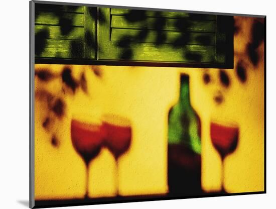 Shadow of Red Wine Bottle and Red Wine Glasses on Wall-Peter Howard Smith-Mounted Photographic Print