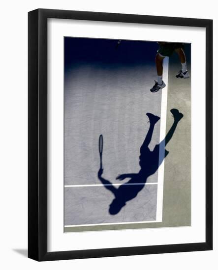 Shadow of Tennis Player Serving-null-Framed Photographic Print