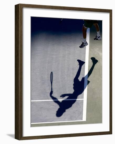 Shadow of Tennis Player Serving-null-Framed Photographic Print