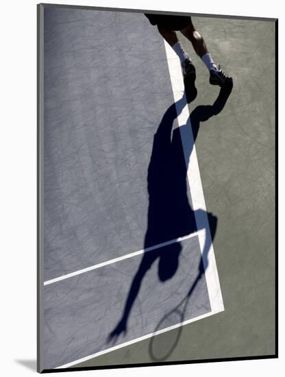 Shadow of Tennis Player Serving-null-Mounted Photographic Print