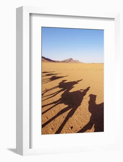 Shadows of people riding camels in a caravan at Zagora Desert, Draa-Tafilalet Region, Morocco-Karol Kozlowski-Framed Photographic Print