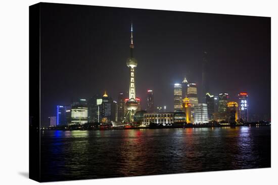 Shanghai, China, Evening Cityscape and Lights with River Reflection-Darrell Gulin-Stretched Canvas