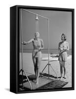 Shapely Sunbather Taking an Outdoor Shower as Woman Preparing for Her Turn, Looks On, at Beach-Alfred Eisenstaedt-Framed Stretched Canvas