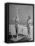 Shapely Sunbather Taking an Outdoor Shower as Woman Preparing for Her Turn, Looks On, at Beach-Alfred Eisenstaedt-Framed Stretched Canvas