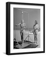 Shapely Sunbather Taking an Outdoor Shower as Woman Preparing for Her Turn, Looks On, at Beach-Alfred Eisenstaedt-Framed Photographic Print