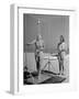 Shapely Sunbather Taking an Outdoor Shower as Woman Preparing for Her Turn, Looks On, at Beach-Alfred Eisenstaedt-Framed Photographic Print