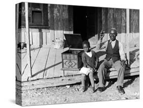 Sharecropper, Lonnie Fair and Daughter Listen to Victrola on Farm in Mississippi-Alfred Eisenstaedt-Stretched Canvas