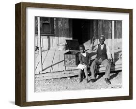 Sharecropper, Lonnie Fair and Daughter Listen to Victrola on Farm in Mississippi-Alfred Eisenstaedt-Framed Photographic Print