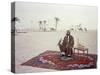 Sheikh Shakhbut Bin Sultan Al Nahyan Sitting in Front of His Palace Holding a Falcon, 1963-Ralph Crane-Stretched Canvas