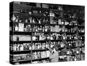 Shelves of Illegal Liquor Stored in the Nypd Property Clerks Office-Carl Mydans-Stretched Canvas