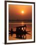 Shikara, or Kashmiri Boat, in Dal Lake as the Sun Sets in Srinagar, India-Mukhtar Khan-Framed Photographic Print