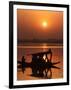 Shikara, or Kashmiri Boat, in Dal Lake as the Sun Sets in Srinagar, India-Mukhtar Khan-Framed Photographic Print