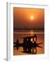 Shikara, or Kashmiri Boat, in Dal Lake as the Sun Sets in Srinagar, India-Mukhtar Khan-Framed Photographic Print