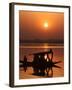 Shikara, or Kashmiri Boat, in Dal Lake as the Sun Sets in Srinagar, India-Mukhtar Khan-Framed Photographic Print