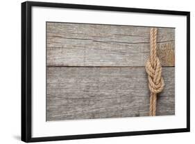 Ship Rope Knot on Old Wooden Texture Background-karandaev-Framed Photographic Print