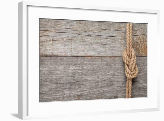 Ship Rope Knot on Old Wooden Texture Background-karandaev-Framed Photographic Print