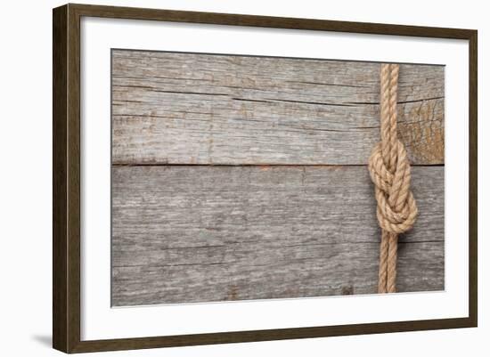 Ship Rope Knot on Old Wooden Texture Background-karandaev-Framed Photographic Print