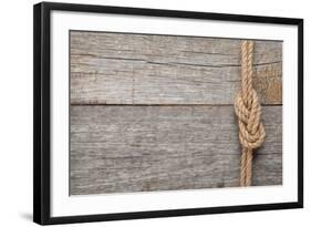 Ship Rope Knot on Old Wooden Texture Background-karandaev-Framed Photographic Print