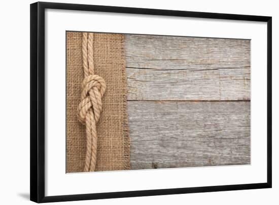 Ship Rope on Old Wood and Burlap Texture Background with Copy Space-karandaev-Framed Photographic Print