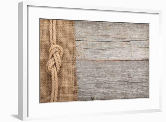 Ship Rope on Old Wood and Burlap Texture Background with Copy Space-karandaev-Framed Photographic Print