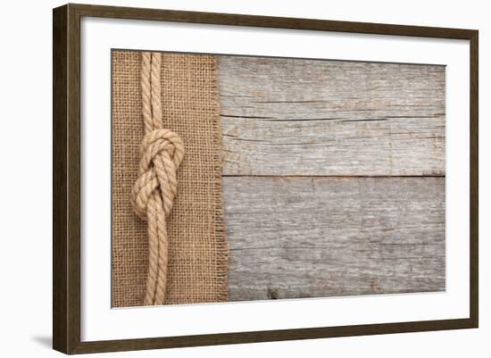 Ship Rope on Old Wood and Burlap Texture Background with Copy Space-karandaev-Framed Photographic Print