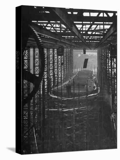 Shipbuilding, 10,000 Ton Merchantman Frames on Overhead Trolley Crane Dropping Plate into Position-William Vandivert-Stretched Canvas