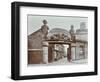 Ships Figureheads over the Gate at Castles Shipbreaking Yard, Westminster, London, 1909-null-Framed Photographic Print