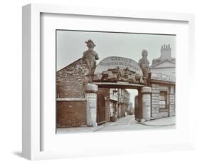 Ships Figureheads over the Gate at Castles Shipbreaking Yard, Westminster, London, 1909-null-Framed Photographic Print