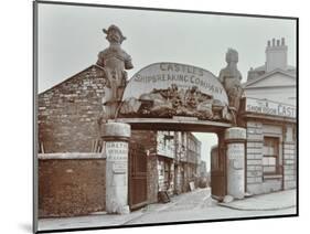 Ships Figureheads over the Gate at Castles Shipbreaking Yard, Westminster, London, 1909-null-Mounted Photographic Print