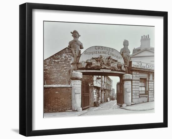 Ships Figureheads over the Gate at Castles Shipbreaking Yard, Westminster, London, 1909-null-Framed Premium Photographic Print