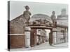Ships Figureheads over the Gate at Castles Shipbreaking Yard, Westminster, London, 1909-null-Stretched Canvas