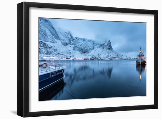 Ships Moored in the Small Harbor of Reine under a Gloomy Sky in the South of the Lofoten Islands-Roberto Moiola-Framed Photographic Print