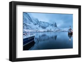 Ships Moored in the Small Harbor of Reine under a Gloomy Sky in the South of the Lofoten Islands-Roberto Moiola-Framed Photographic Print